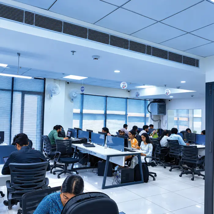 The open lab floor with every desk in use
