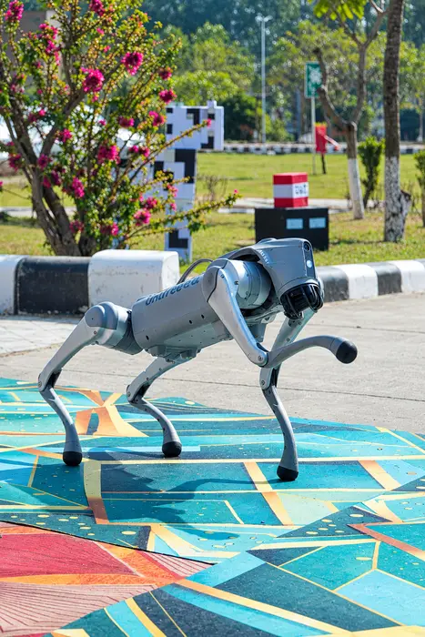 The robot dog out on a college campus